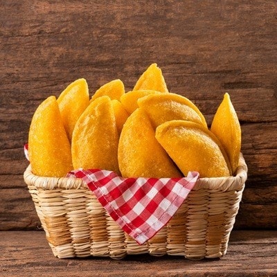 Basket with fried empanadas with meat filling - Typical Colombian food