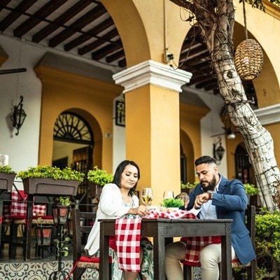 Married couple having dinner at a restaurant outdoors