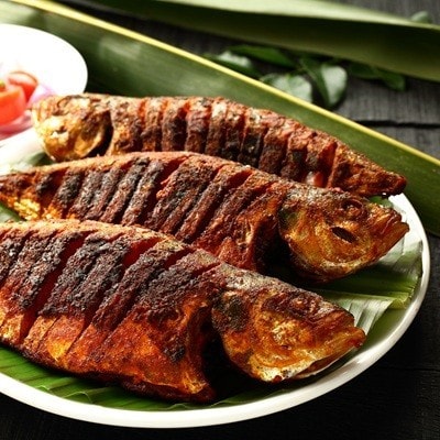 Delicious roasted fish with herbs and spices.