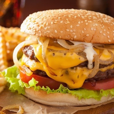 double cheeseburger with tomato and onion